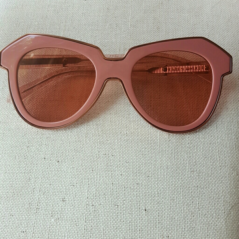 Karen Walker “Number One” rose-gold sunglasses